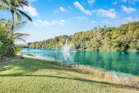 a view of a lake from a yard
