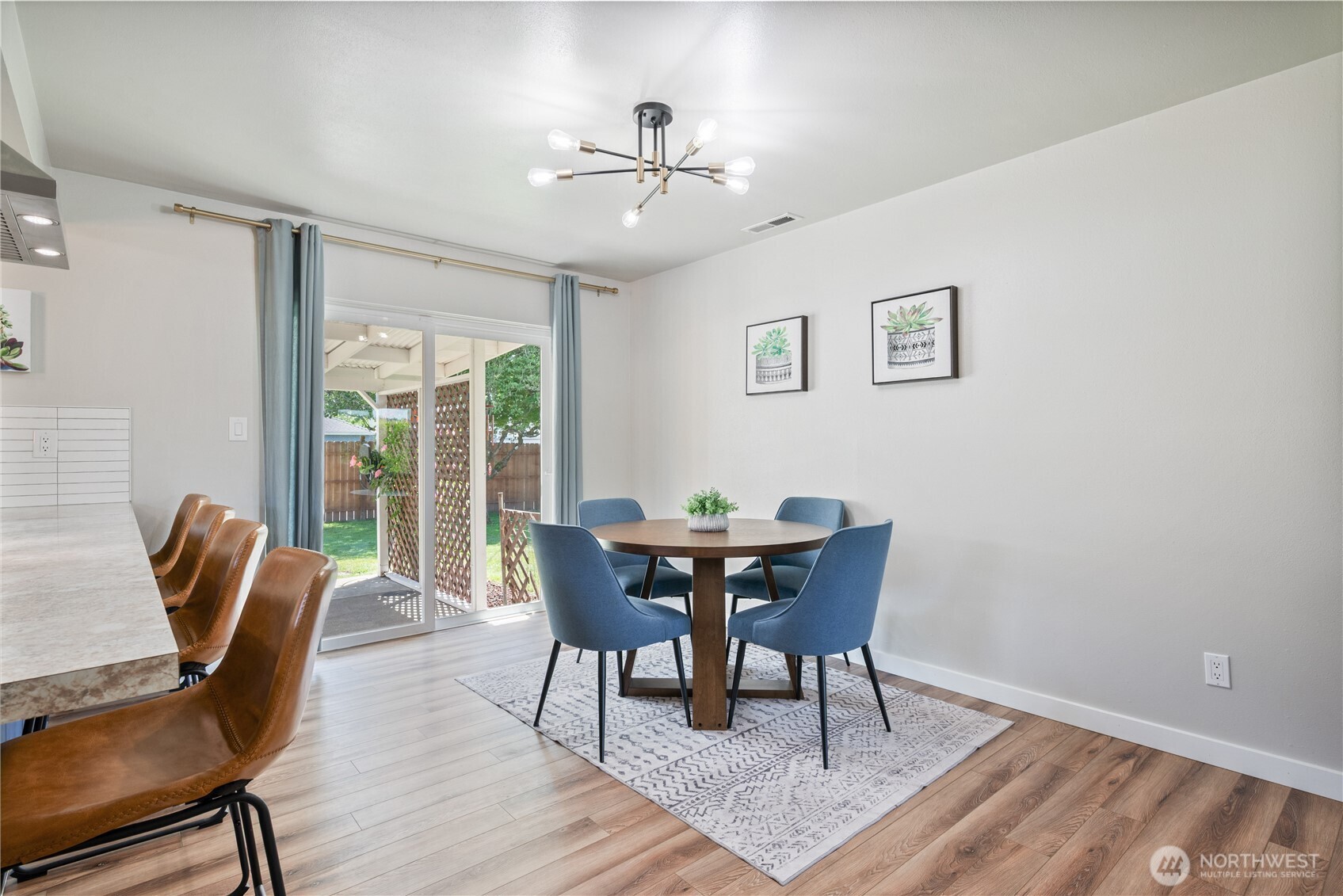2943 Magnolia Street Longview, WA 98632 - Photo 12 of 36 a view of a dining room with furniture window and wooden floor