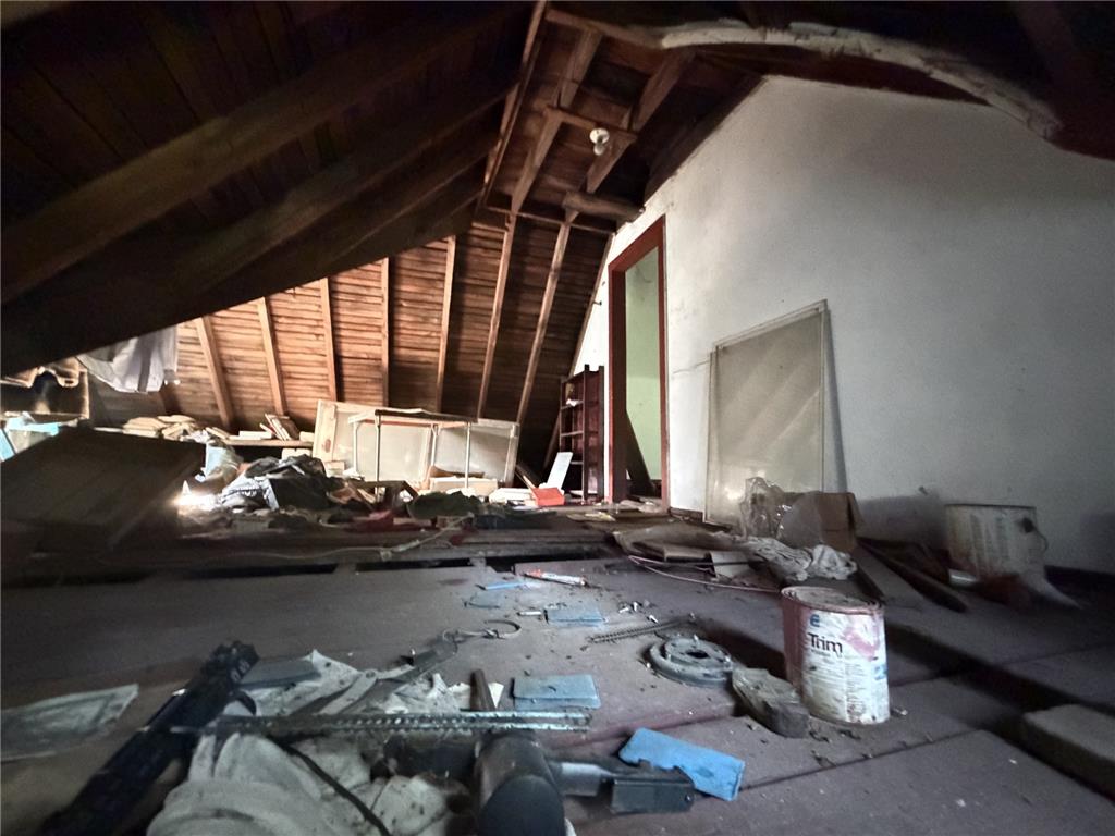 730 Ridge Road Shickshinny, PA 18655 - Photo 42 of 44 Unfinished attic space offers ample storage potential with visible wood beam construction.