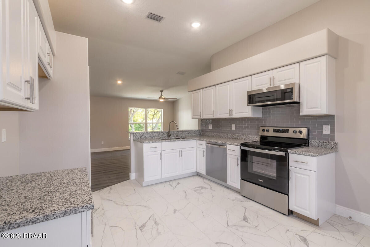 6018 Spruce Point Circle Port Orange, FL 32128 - Photo 5 of 12 6018-12jpg