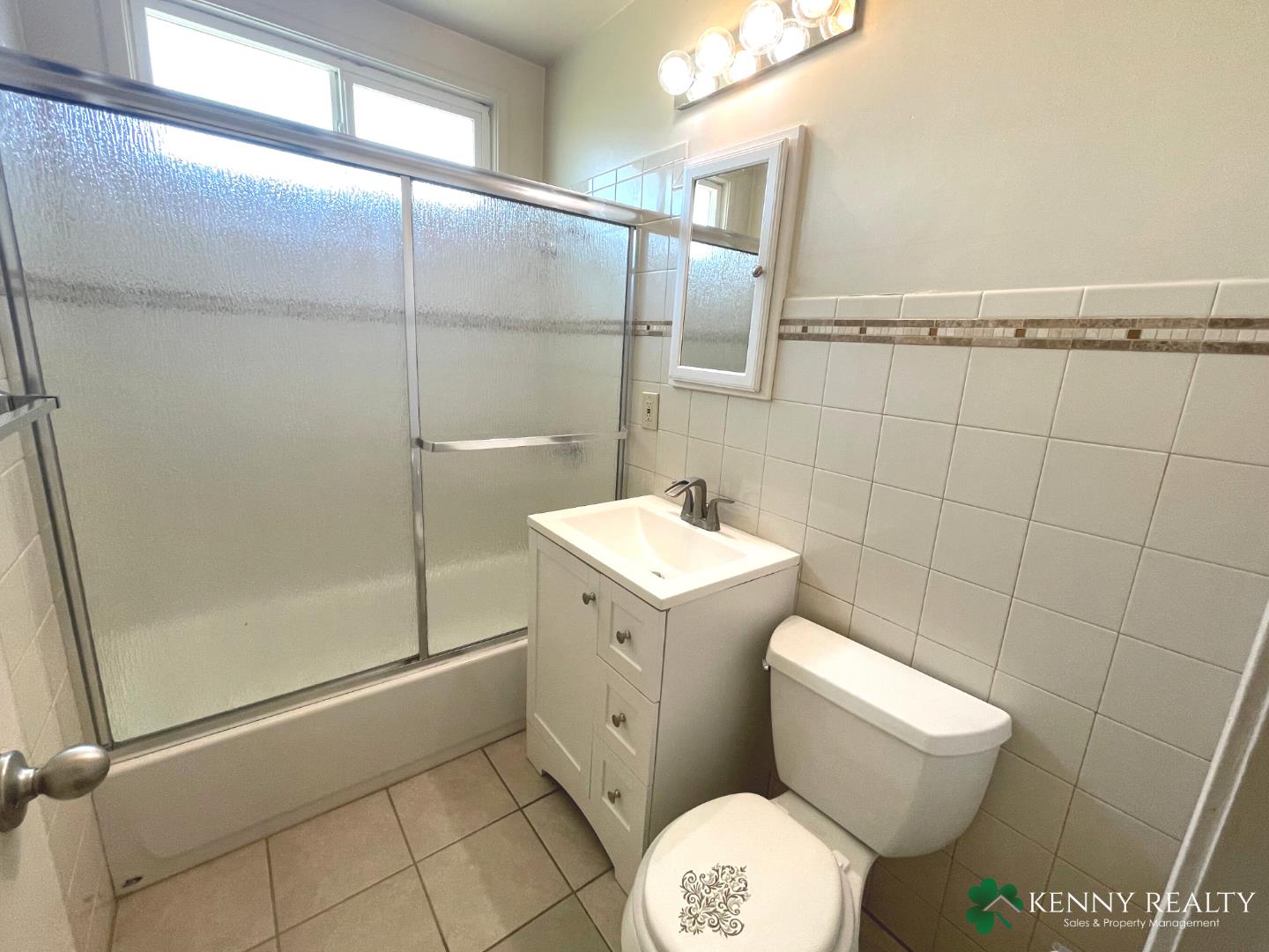 1059 Anza Drive Pacifica, CA 94044 - Photo 12 of 18 a bathroom with a sink a toilet and shower