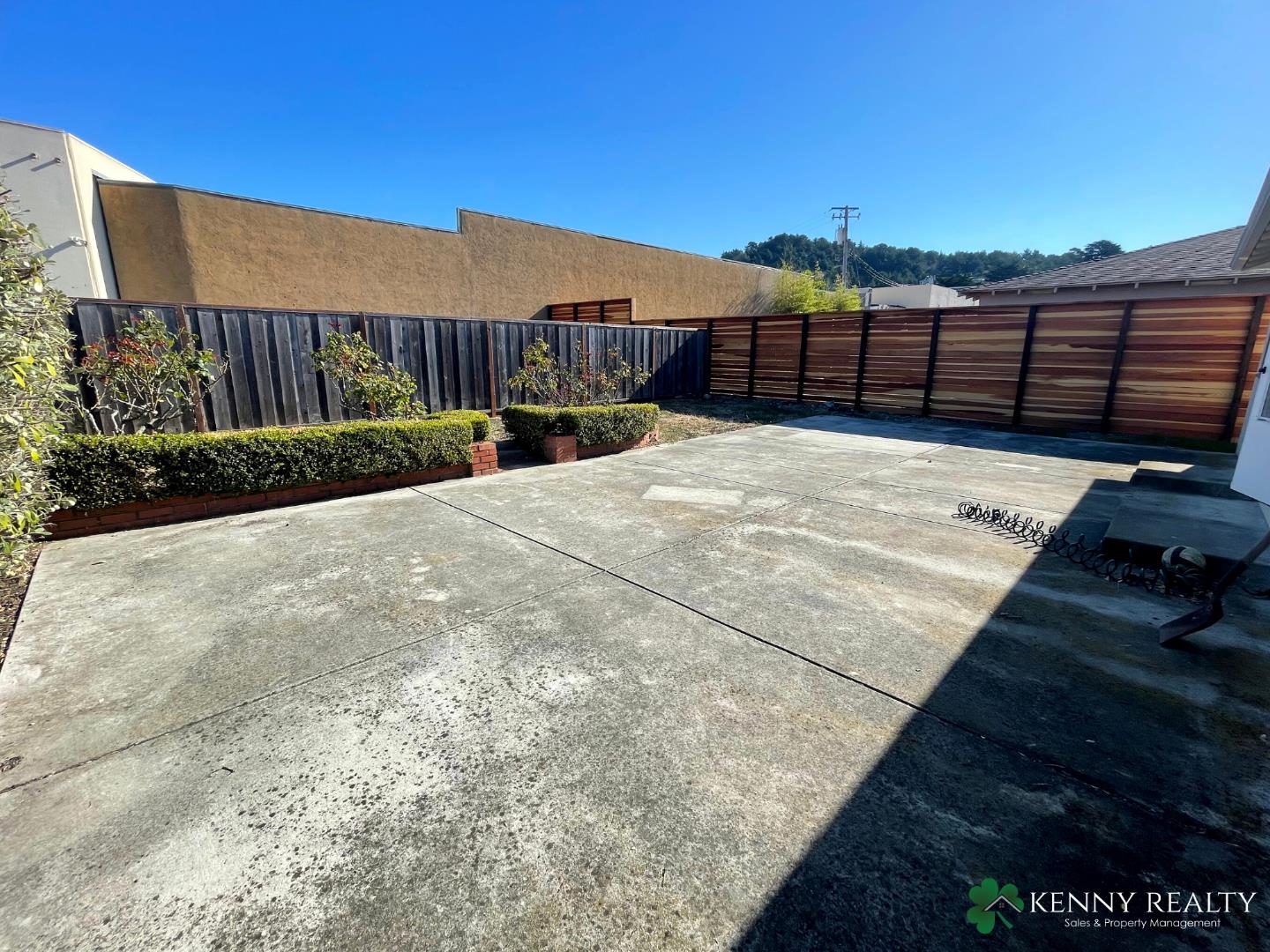 1059 Anza Drive Pacifica, CA 94044 - Photo 13 of 18 a view of a terrace with a bench