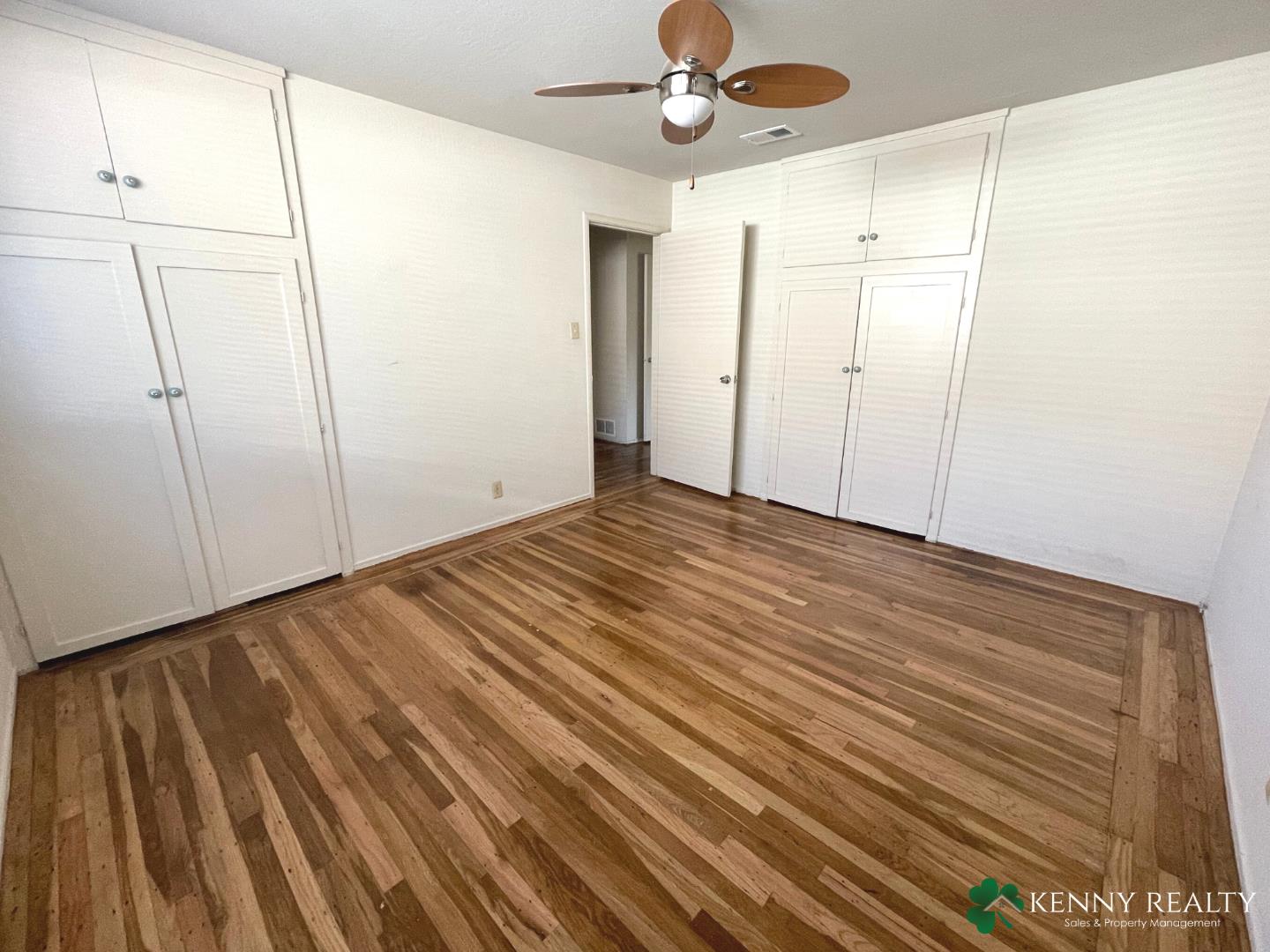 1059 Anza Drive Pacifica, CA 94044 - Photo 9 of 18 a view of empty room with wooden floor