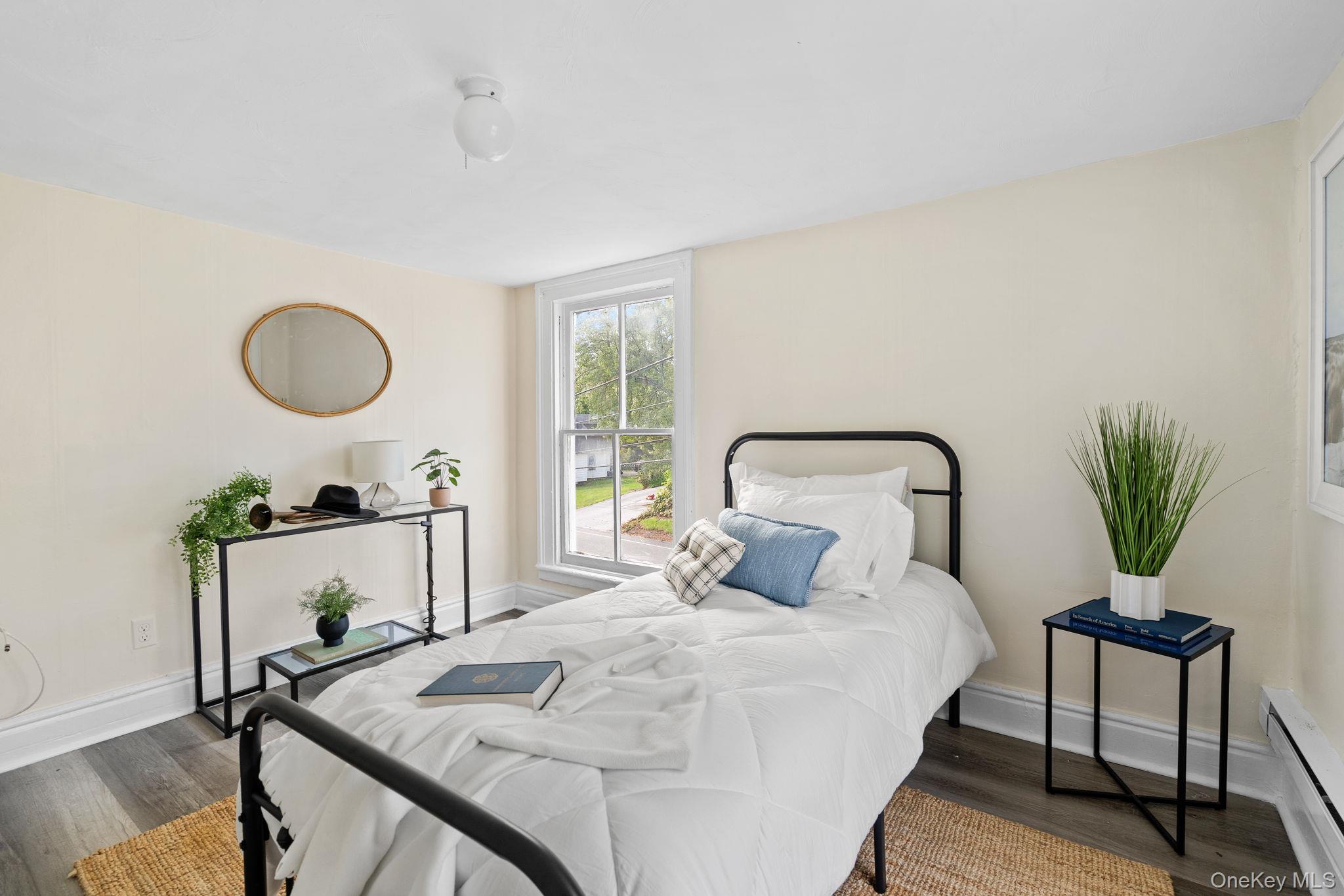 8 Coldenham Road Walden, NY 12586 - Photo 24 of 50 Bedroom with baseboard heating and dark wood-style floors