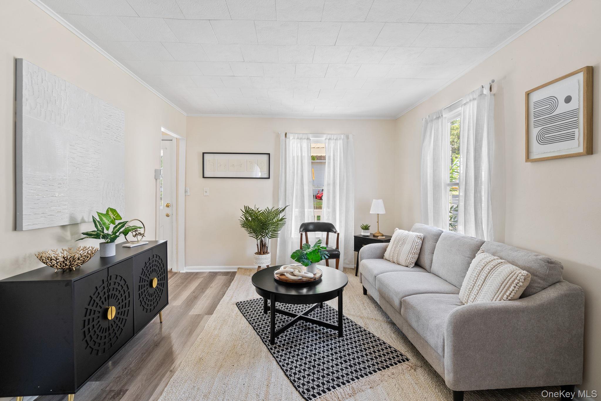 8 Coldenham Road Walden, NY 12586 - Photo 4 of 50 Living room with ornamental molding and wood finished floors