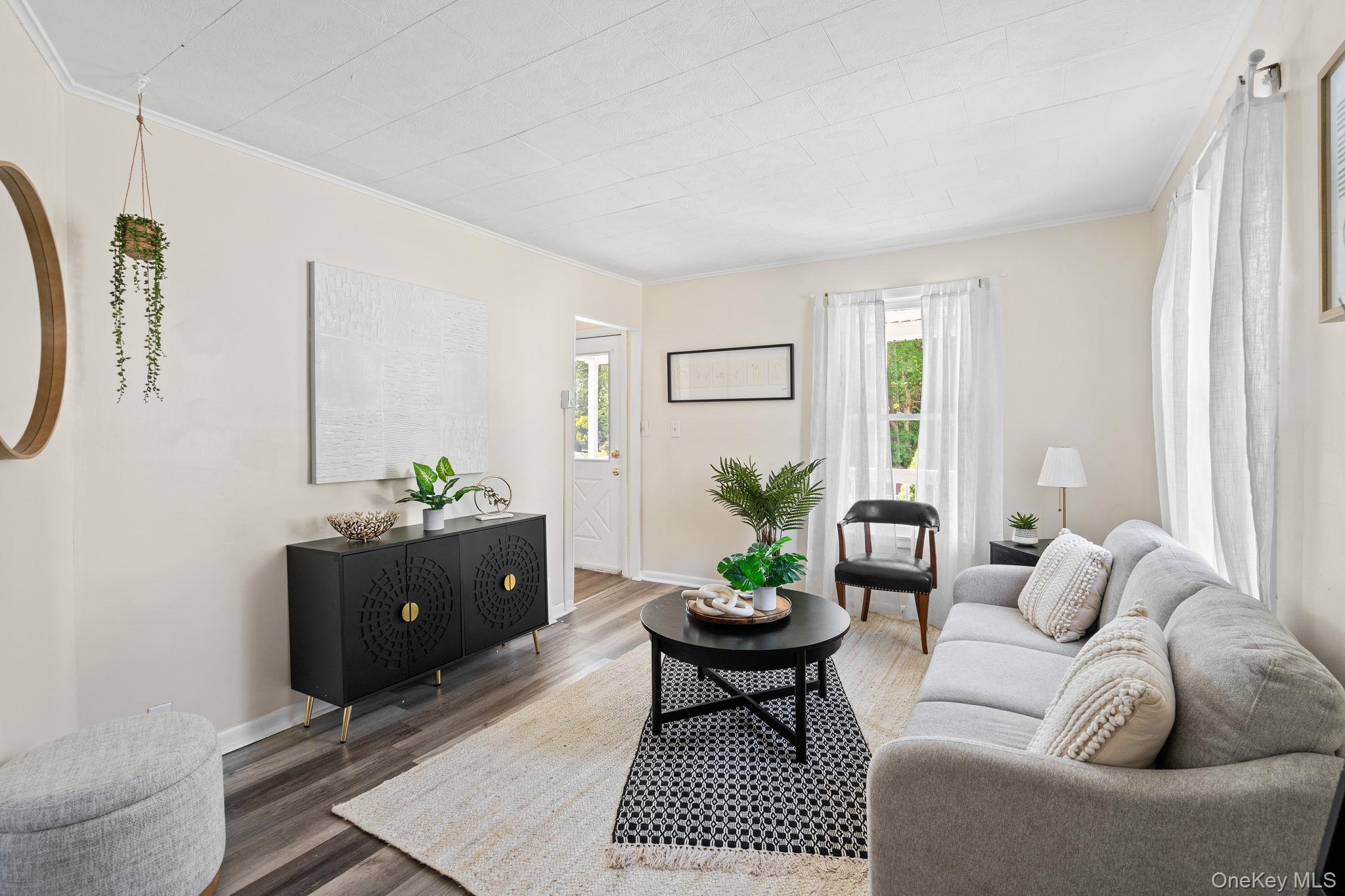 8 Coldenham Road Walden, NY 12586 - Photo 7 of 50 Living area with crown molding and wood finished floors