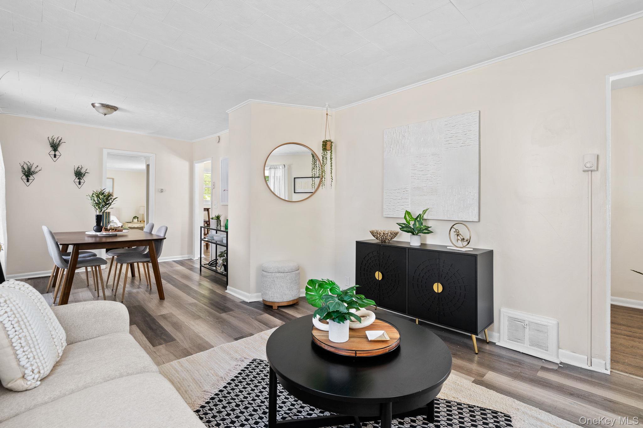 8 Coldenham Road Walden, NY 12586 - Photo 8 of 50 Living area featuring crown molding and wood finished floors