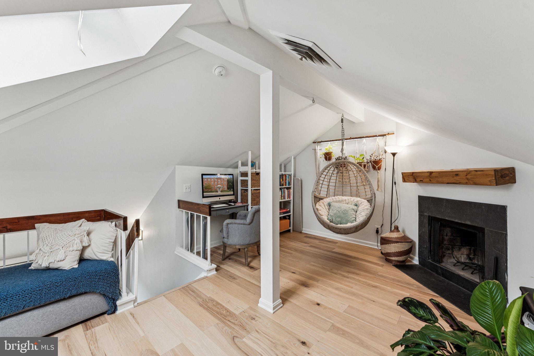 509 Bashford Lane, Unit 6 Alexandria, VA 22314 - Photo 17 of 20 a living room with furniture and a fireplace