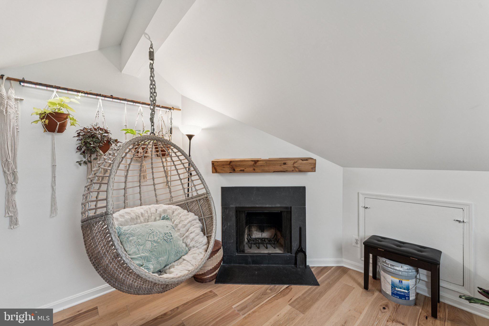 509 Bashford Lane, Unit 6 Alexandria, VA 22314 - Photo 18 of 20 a living room with furniture and a fireplace