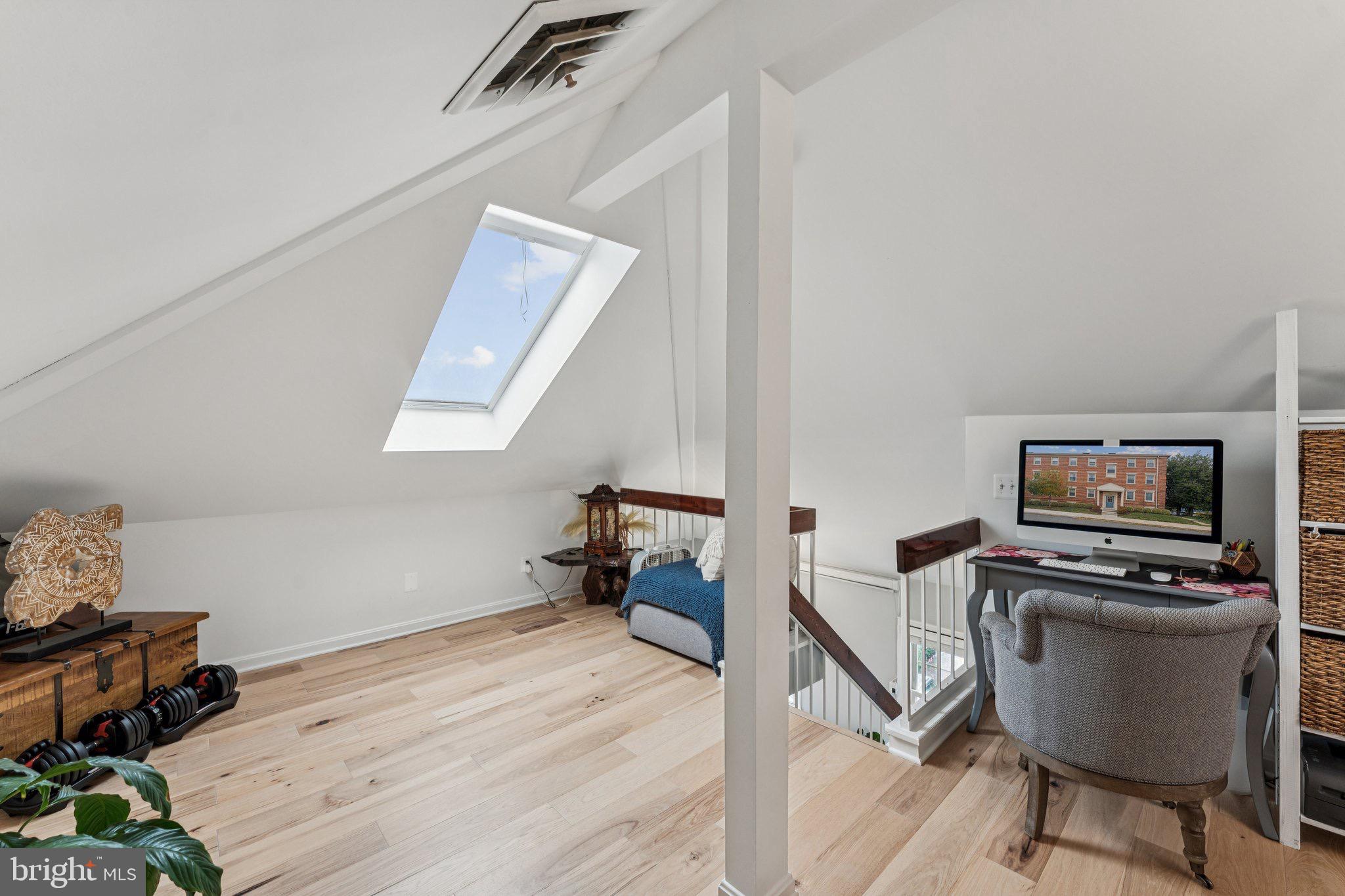 509 Bashford Lane, Unit 6 Alexandria, VA 22314 - Photo 19 of 20 a room with furniture and a flat screen tv