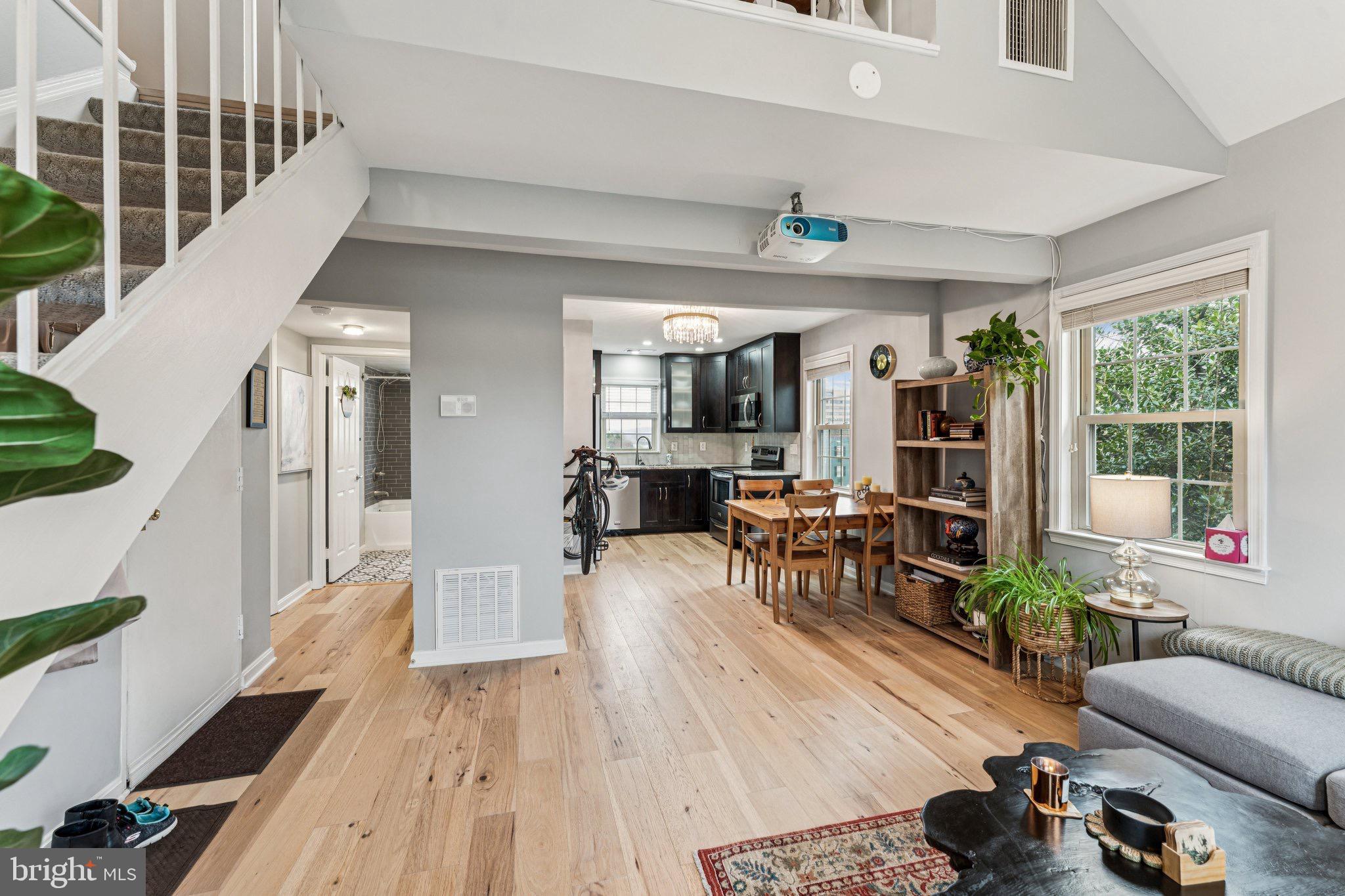 509 Bashford Lane, Unit 6 Alexandria, VA 22314 - Photo 3 of 20 a living room with furniture and a table