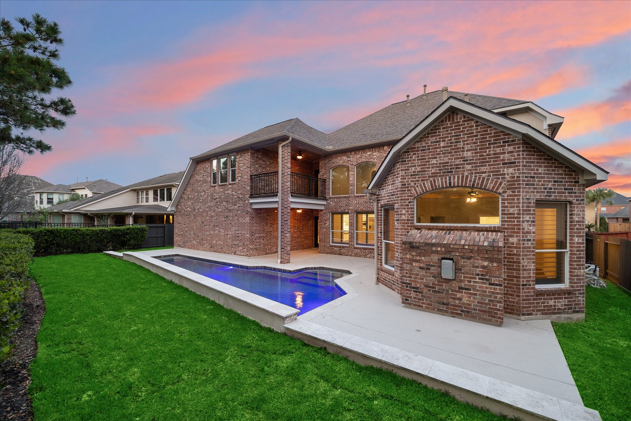 6211 Alameda Point Lane Houston, TX 77041 - Photo 46 of 50 Views of the resort-style backyard and pool from both the primary bedroom and family room.