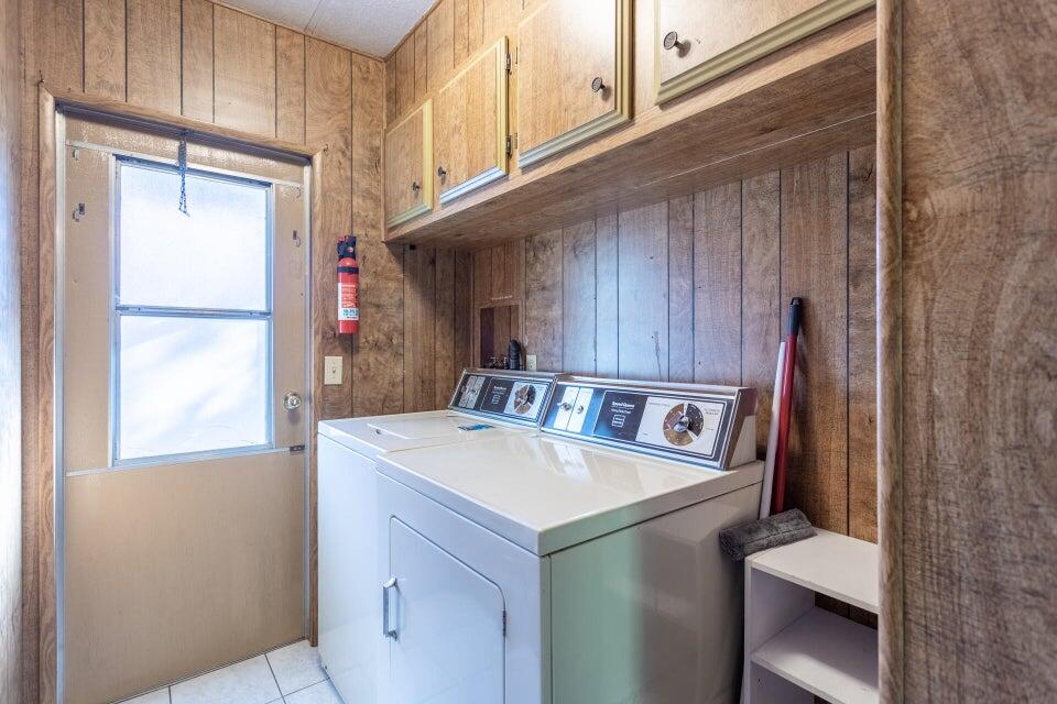 11037 Erickson Way, Unit 71 Redding, CA 96003 - Photo 11 of 13 a kitchen with a sink and a refrigerator