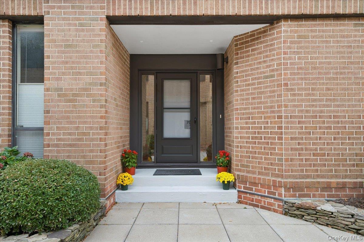 70 Waters Edge, Unit 70 Rye, NY 10580 - Photo 13 of 44 Entrance to property with brick siding