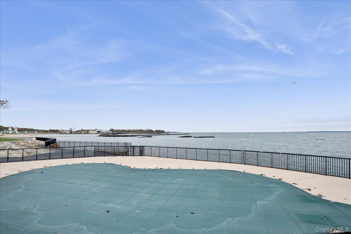 70 Waters Edge, Unit 70 Rye, NY 10580 - Photo 39 of 44 View of pool with a water view of Long Island Sound