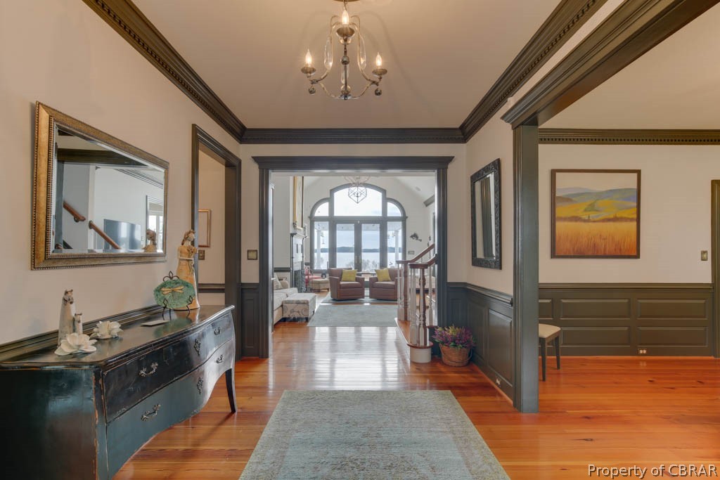 3459 Stonewall Road Hayes, VA 23072 - Photo 14 of 50 This large foyer area welcomes you and your guests with a river view! It opens to the dining room, sitting room and leads to the living room on the back of the house.