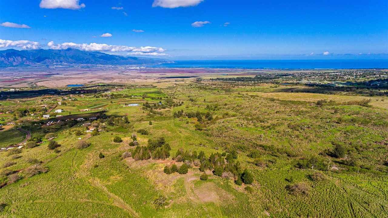 704 Omaopio Road Kula, HI 96790 - Photo 10 of 30 a view of an ocean from a room