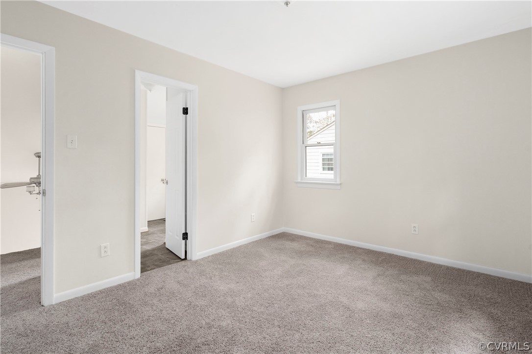 10316 Reams Road Richmond, VA 23236 - Photo 15 of 32 an empty room with windows and closet