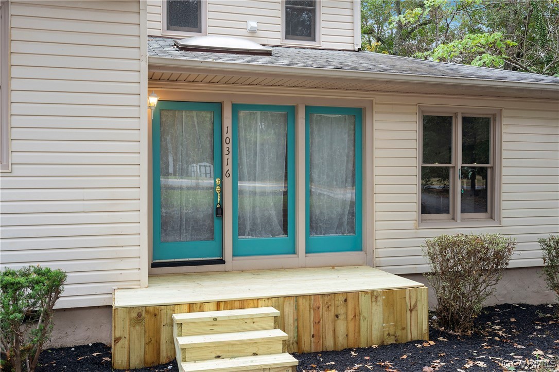 10316 Reams Road Richmond, VA 23236 - Photo 2 of 32 a yellow house with outdoor space