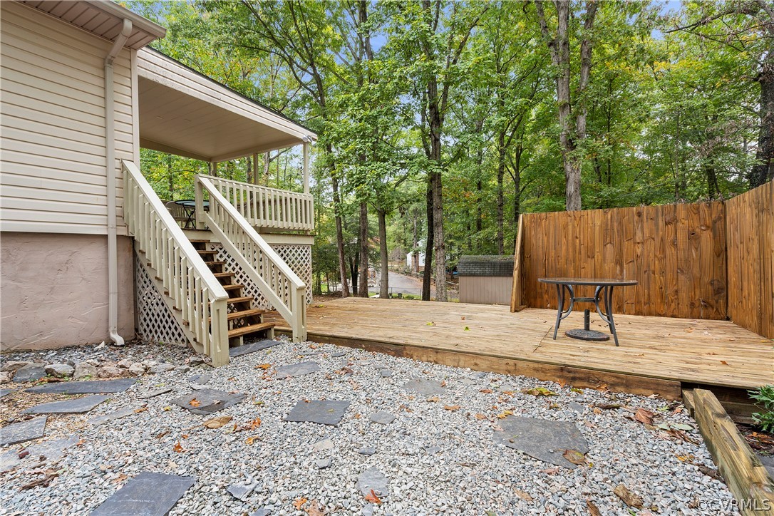 10316 Reams Road Richmond, VA 23236 - Photo 26 of 32 a view of outdoor space with deck and backyard