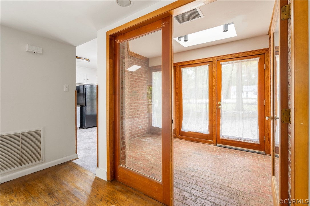 10316 Reams Road Richmond, VA 23236 - Photo 5 of 32 a view of an empty room and window