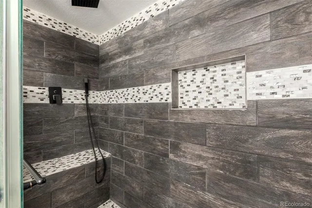 a view of storage and utility room with washer and dryer