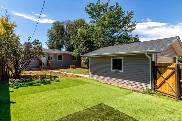 a front view of a house with a garage