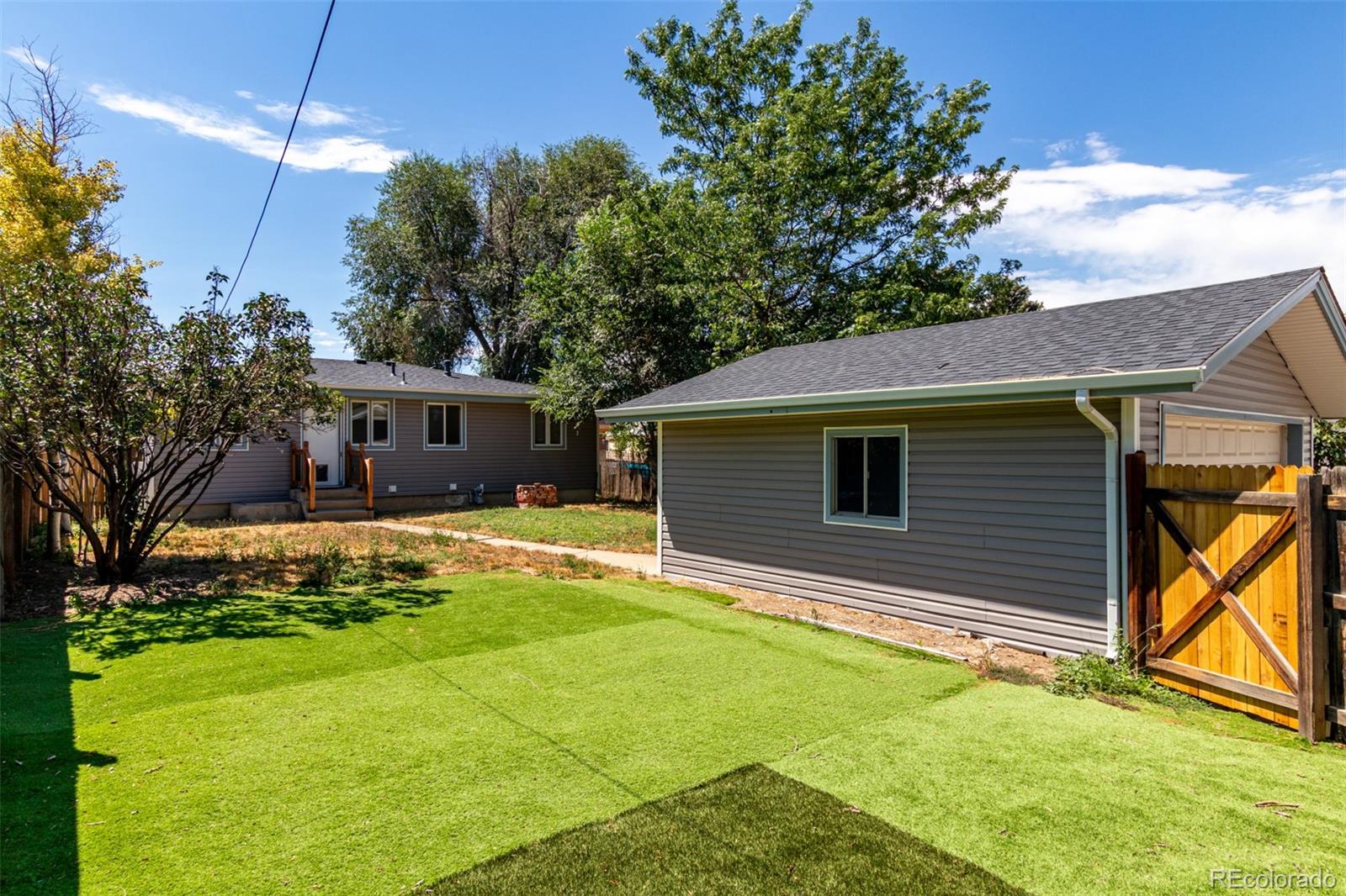 117 6th Street Frederick, CO 80530 - Photo 37 of 43 a view of house with backyard