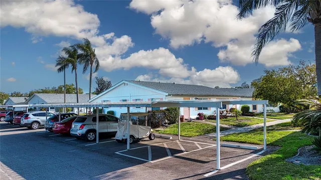 a view of a room with gym equipment and a window