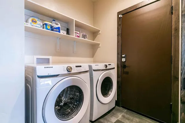 a utility room with dryer and washer