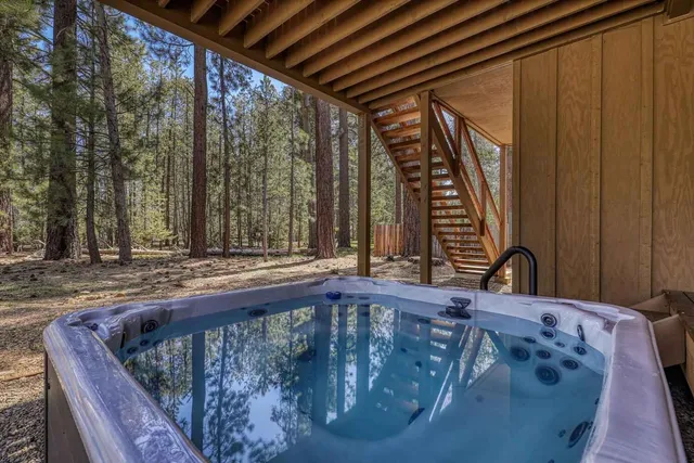 a view of swimming pool and a sitting area