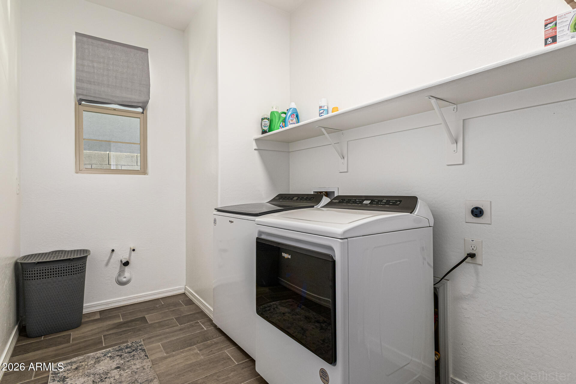 Undisclosed Address Avondale, AZ 85323 - Photo 26 of 32 a utility room with dryer and washer