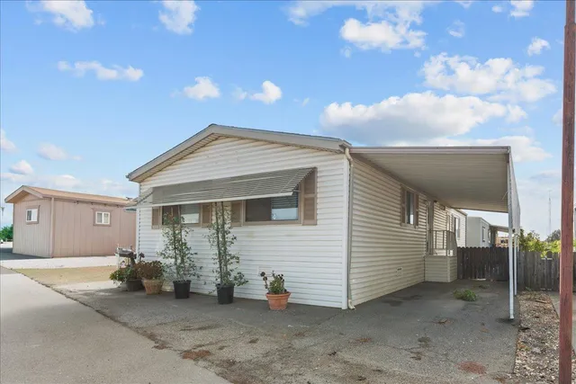 a view of a house with a patio