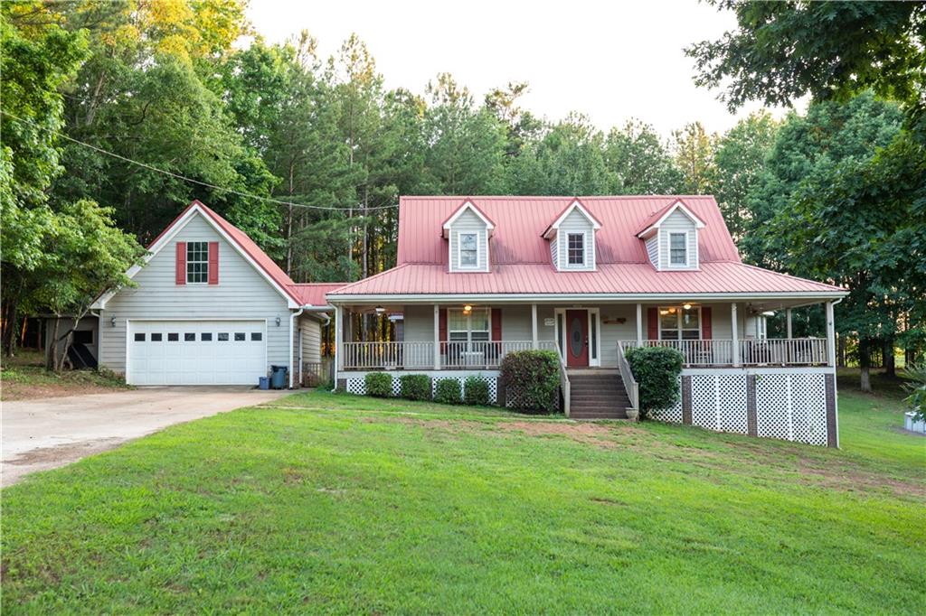 315 Bates Road Covington, GA 30014 - Photo 1 of 1 a view of a house with a yard and potted plants