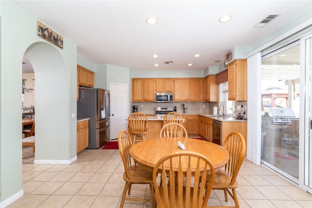 23746 Fieldcrest Lane Murrieta, CA 92562 - Photo 11 of 54 a view of a dining room with furniture