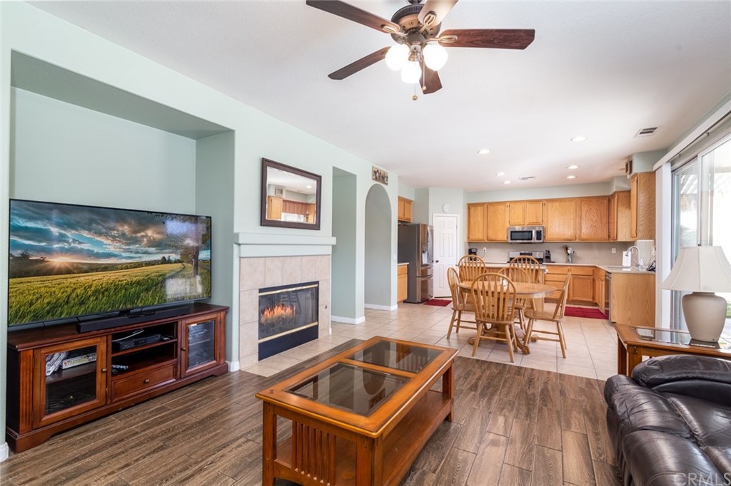 23746 Fieldcrest Lane Murrieta, CA 92562 - Photo 17 of 54 a living room with furniture and a flat screen tv