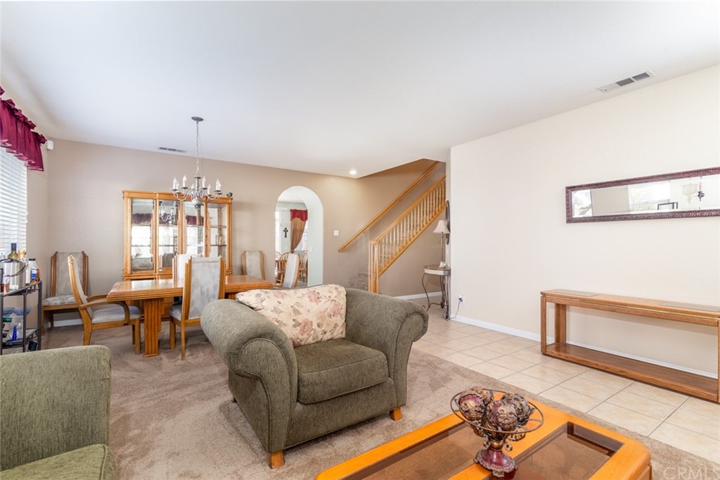 23746 Fieldcrest Lane Murrieta, CA 92562 - Photo 23 of 54 a living room with furniture and wooden floor