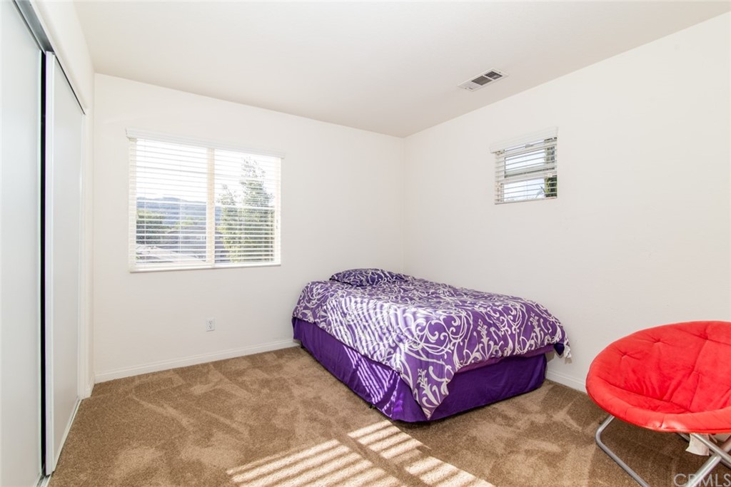 23746 Fieldcrest Lane Murrieta, CA 92562 - Photo 27 of 54 a bedroom with a bed and a window