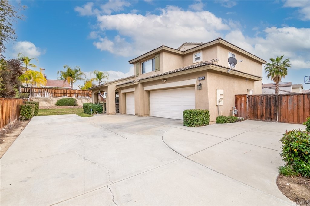 23746 Fieldcrest Lane Murrieta, CA 92562 - Photo 3 of 54 a view of a house with a yard and potted plants