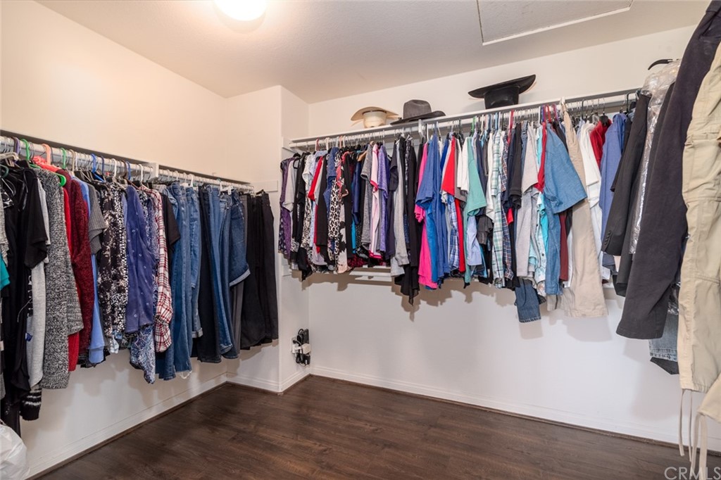 23746 Fieldcrest Lane Murrieta, CA 92562 - Photo 33 of 54 a view of walk in closet with clothes