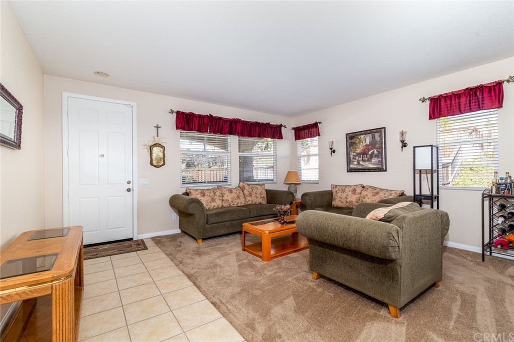 23746 Fieldcrest Lane Murrieta, CA 92562 - Photo 5 of 54 a living room with furniture and a couch