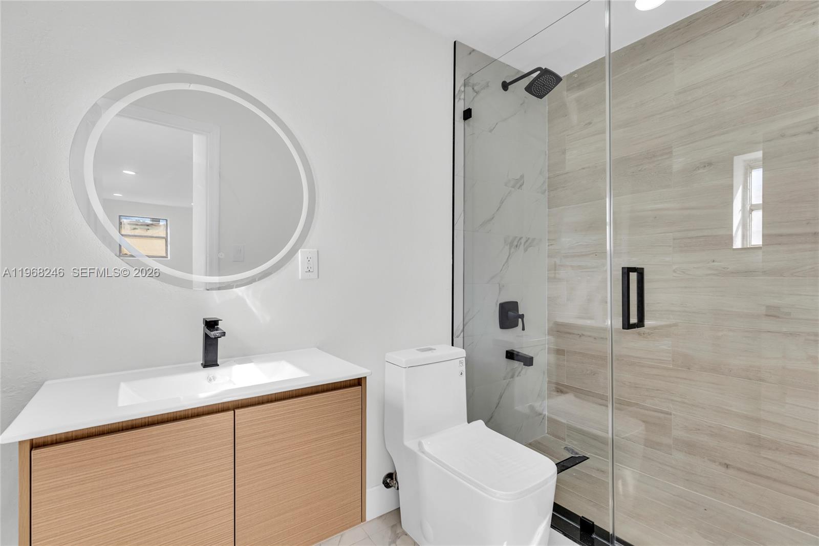 2330 Rutland Street Opa-Locka, FL 33054 - Photo 3 of 29 a bathroom with a sink toilet and shower