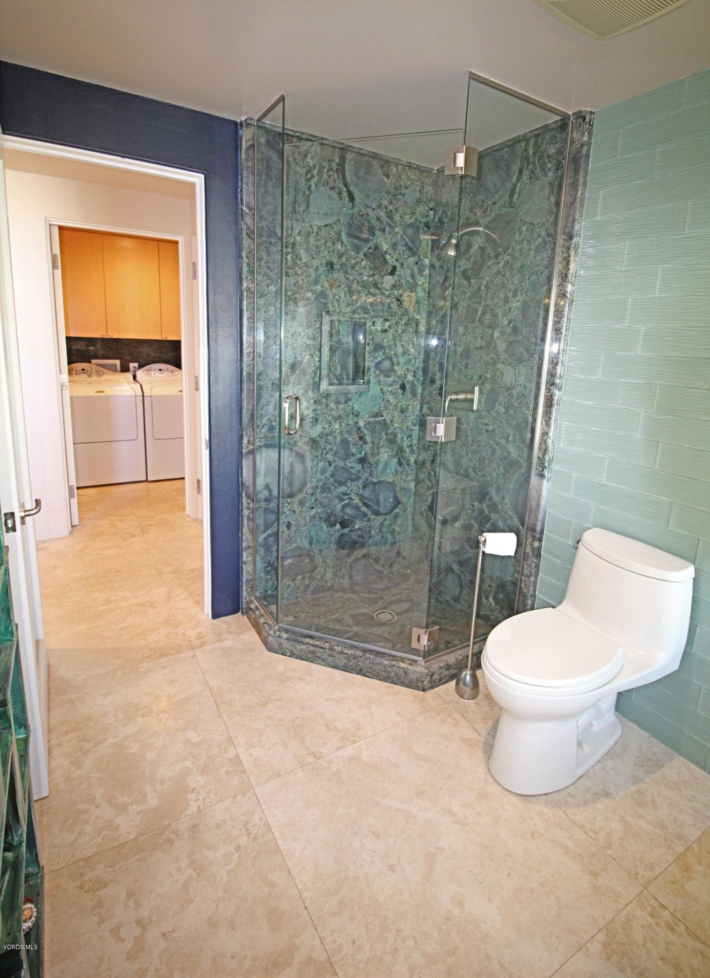 3629 Ocean Drive Oxnard, CA 93035 - Photo 30 of 60 a bathroom with a toilet and a shower