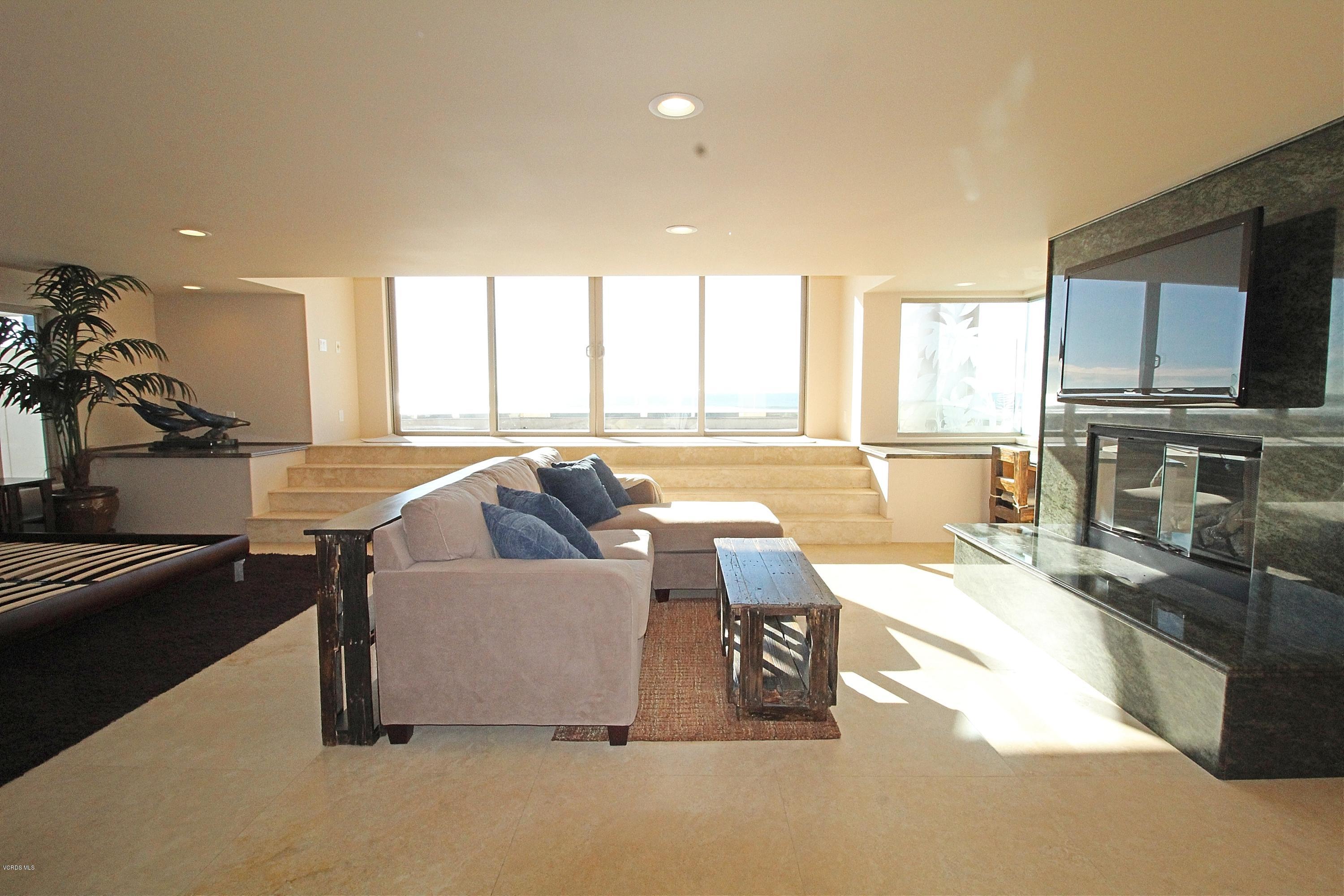 3629 Ocean Drive Oxnard, CA 93035 - Photo 31 of 60 a living room with furniture and a flat screen tv