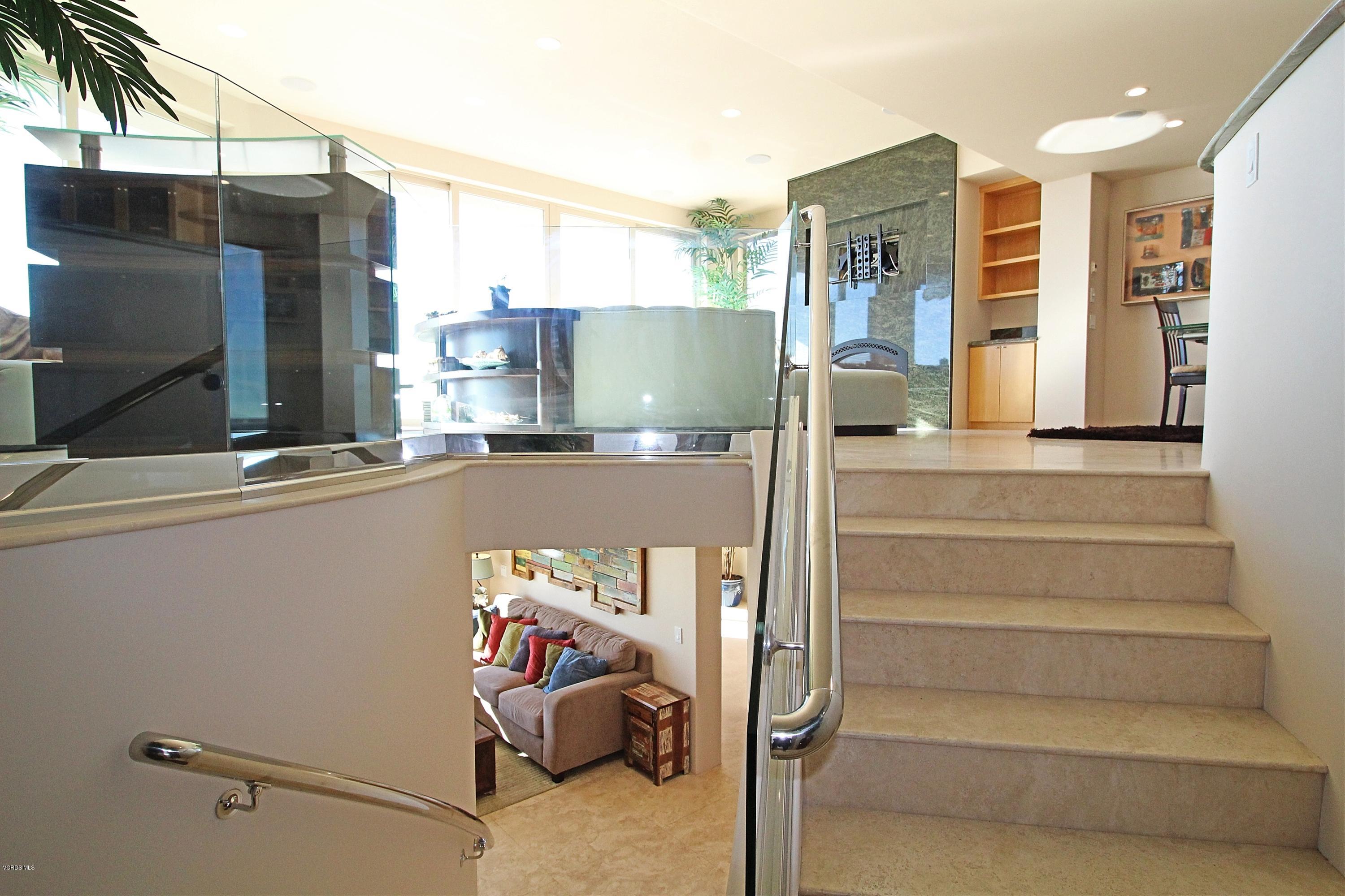 3629 Ocean Drive Oxnard, CA 93035 - Photo 44 of 60 a view of dinning room with floor to ceiling window and potted plants