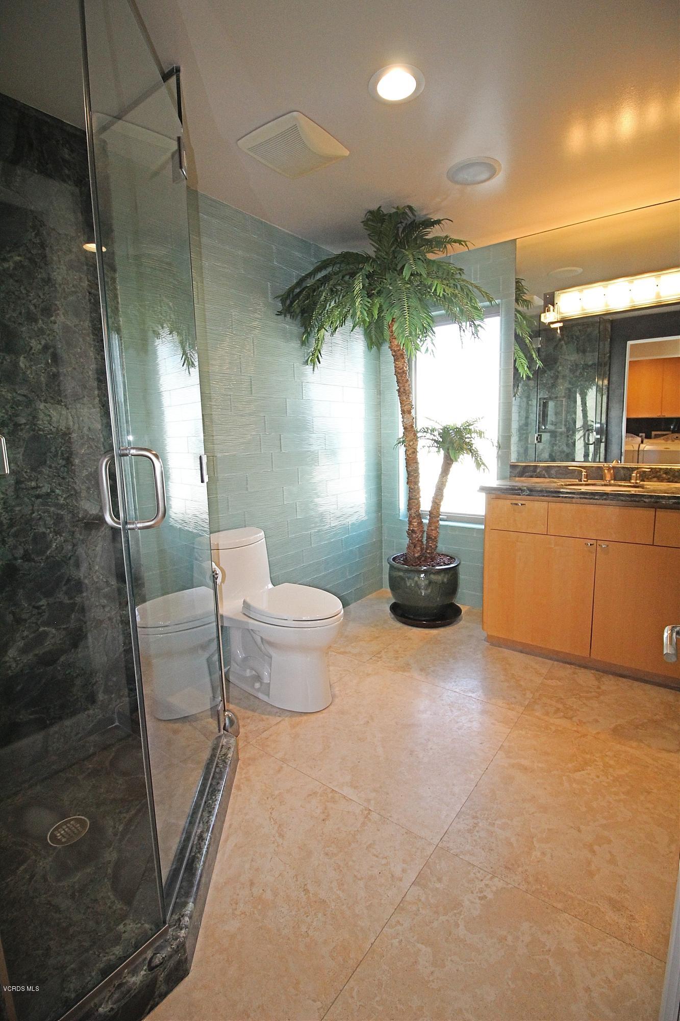 3629 Ocean Drive Oxnard, CA 93035 - Photo 49 of 60 a bathroom with a sink toilet and shower