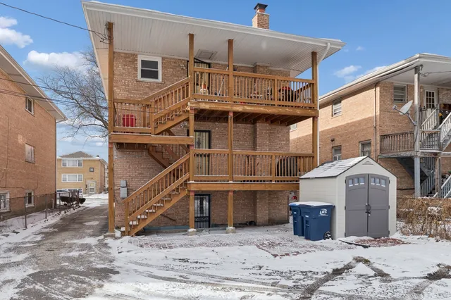 a brick building with a sign on it