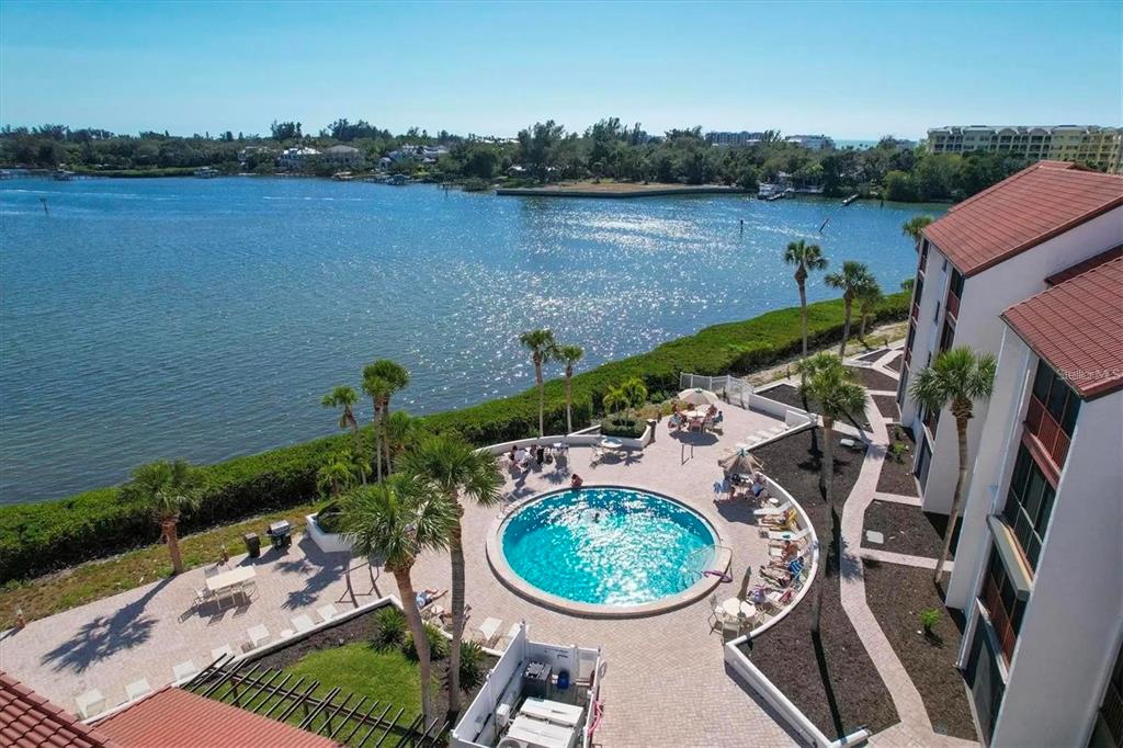 1640 Stickney Point Road, Unit 40101 Sarasota, FL 34231 - Photo 20 of 30 an aerial view of a house with outdoor space and lake view