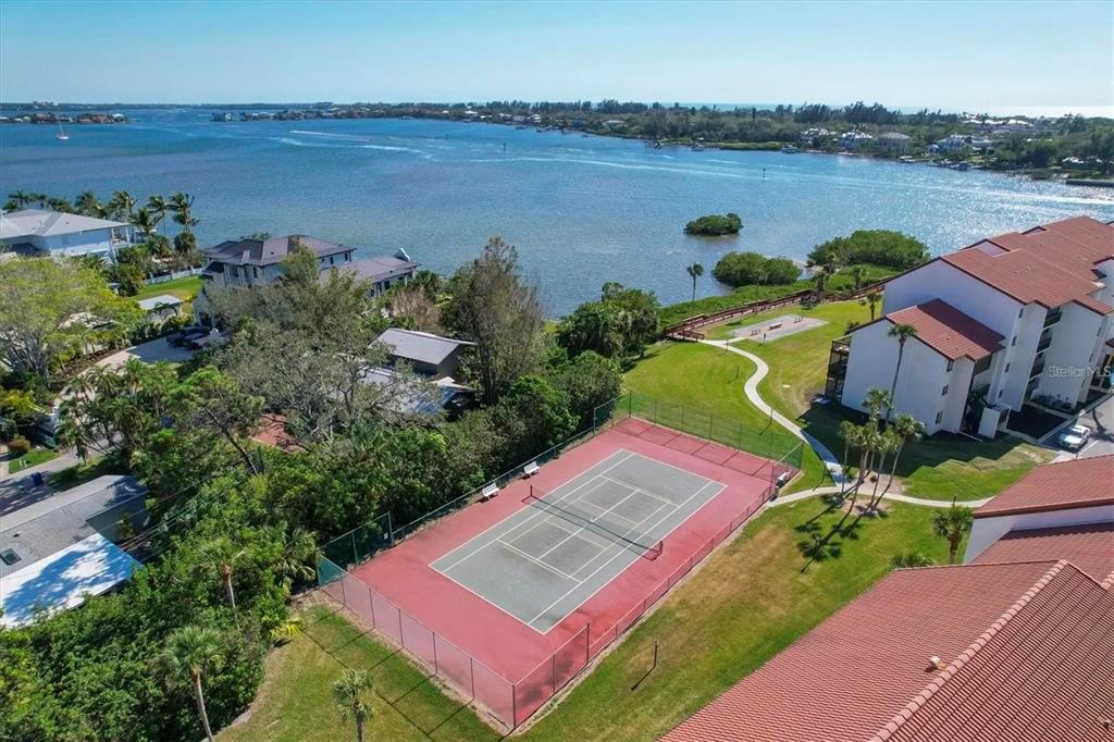 1640 Stickney Point Road, Unit 40101 Sarasota, FL 34231 - Photo 21 of 30 an aerial view of a house with a lake view