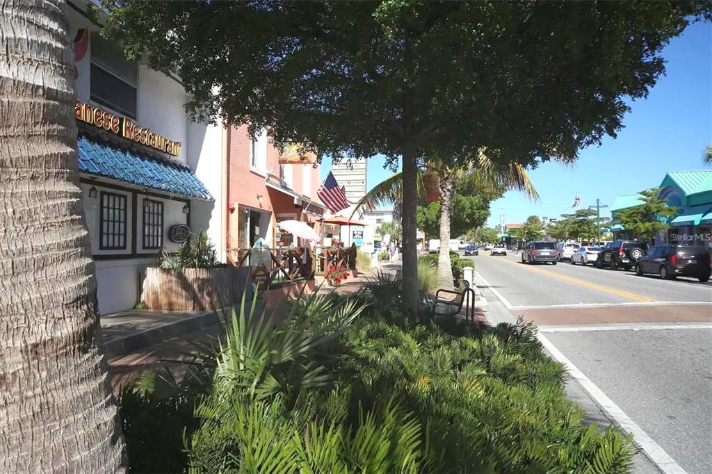 1640 Stickney Point Road, Unit 40101 Sarasota, FL 34231 - Photo 27 of 30 a view of street with parked cars